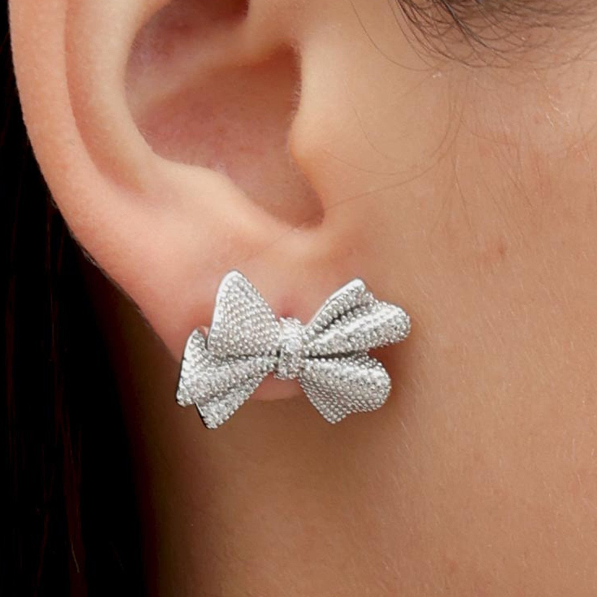 RSNY shiny bow stud earrings - R2183A