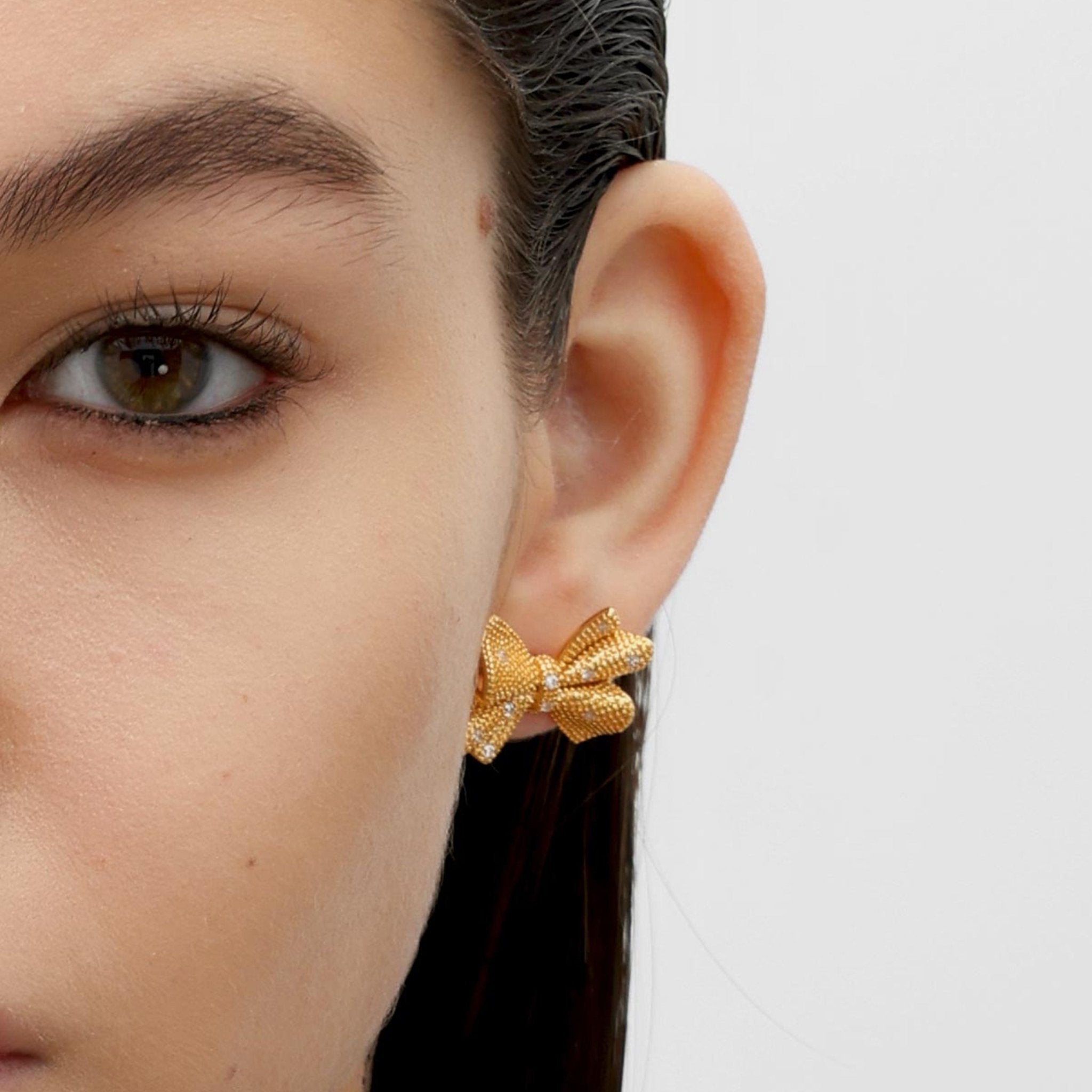 RSNY shiny bow stud earrings - R2183B